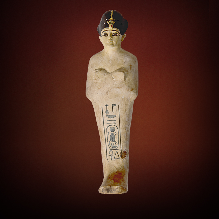 LIMESTONE SHABTI WITH BLUE CROWN