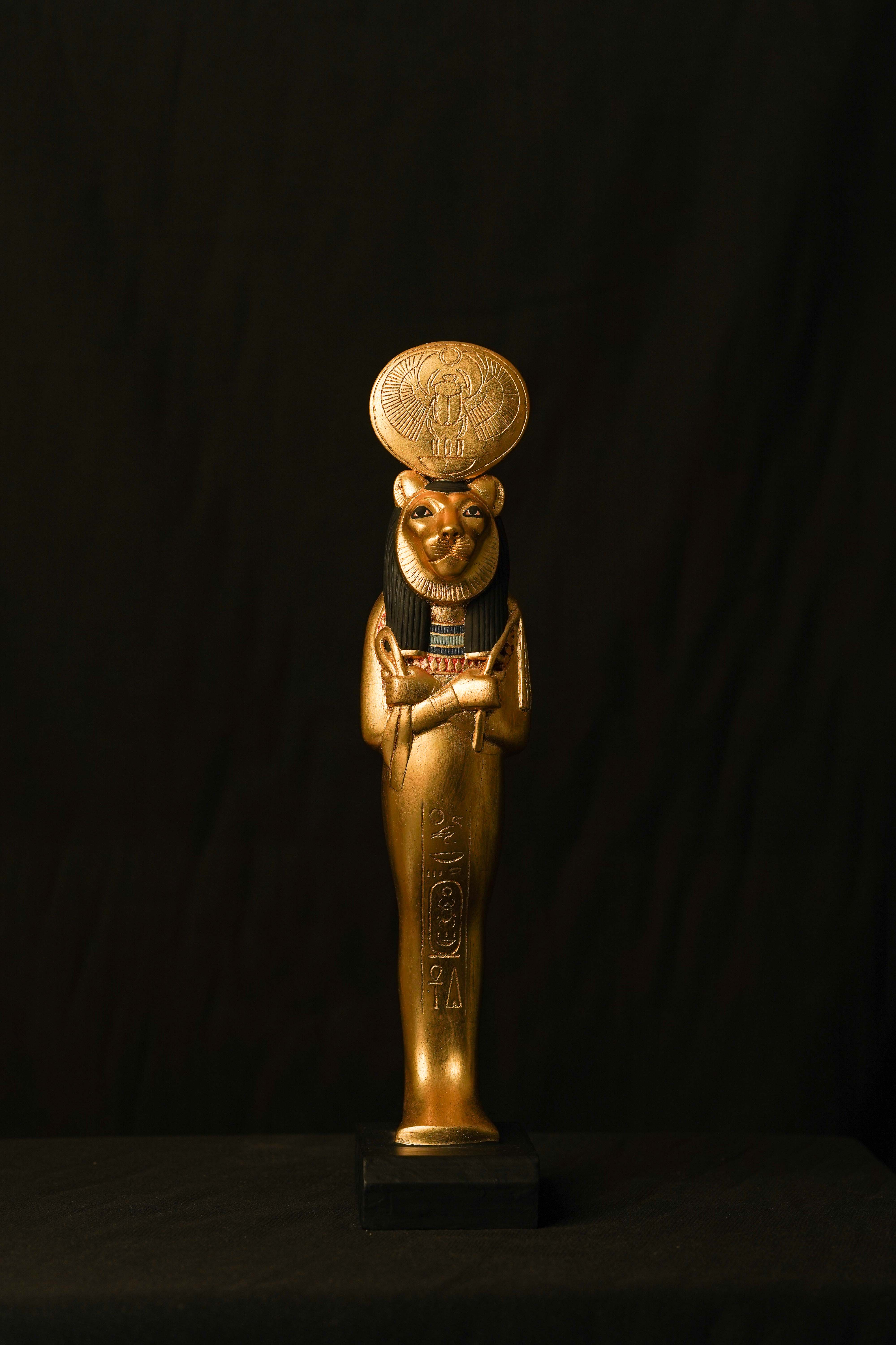 The Great Goddess Sekhmet statue with Beetle scarab crown.